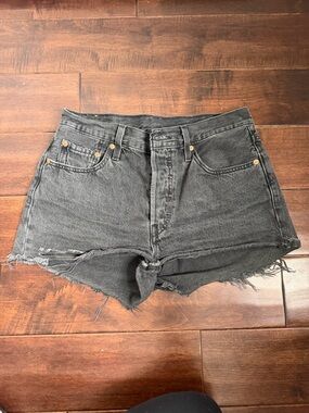 Levi’s 501 black washed denim cut off short